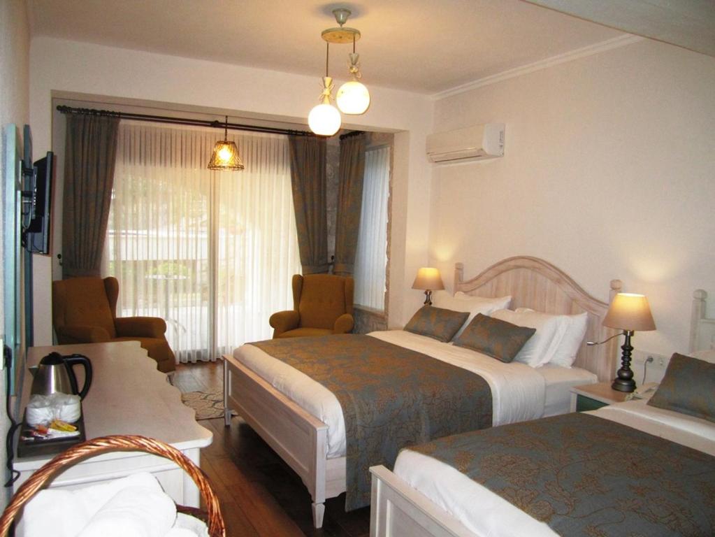 Postel nebo postele na pokoji v ubytování Villa TN - Fethiye
