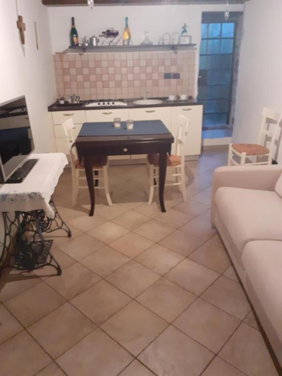 Kuchyň nebo kuchyňský kout v ubytování Cà Tinola
