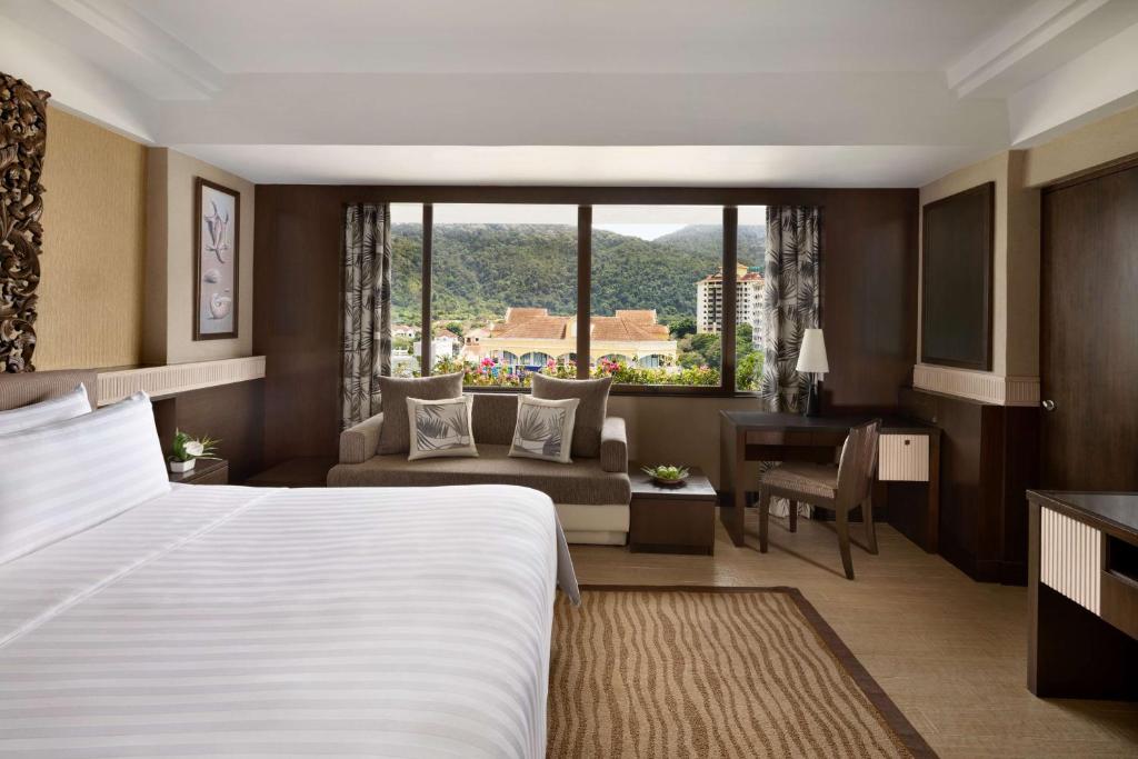 Voodi või voodid majutusasutuse Shangri-La Golden Sands, Penang toas
