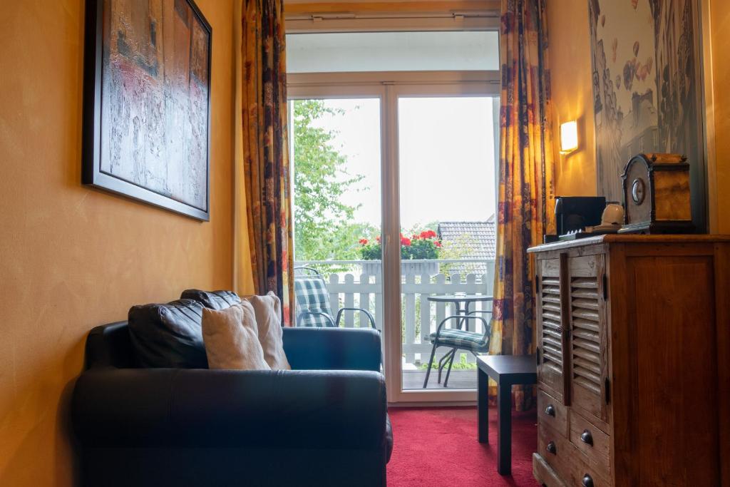 Posezení v ubytování Hotel Landhaus Knappmann