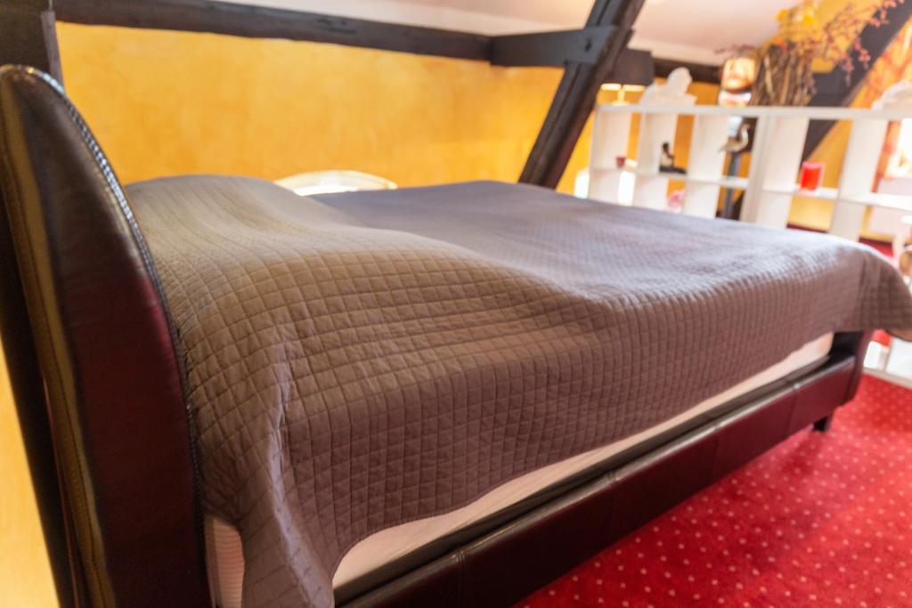 Postel nebo postele na pokoji v ubytování Hotel Landhaus Knappmann