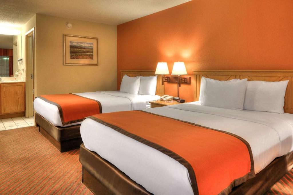 Cama o camas de una habitación en Econo Lodge Pigeon Forge Riverside