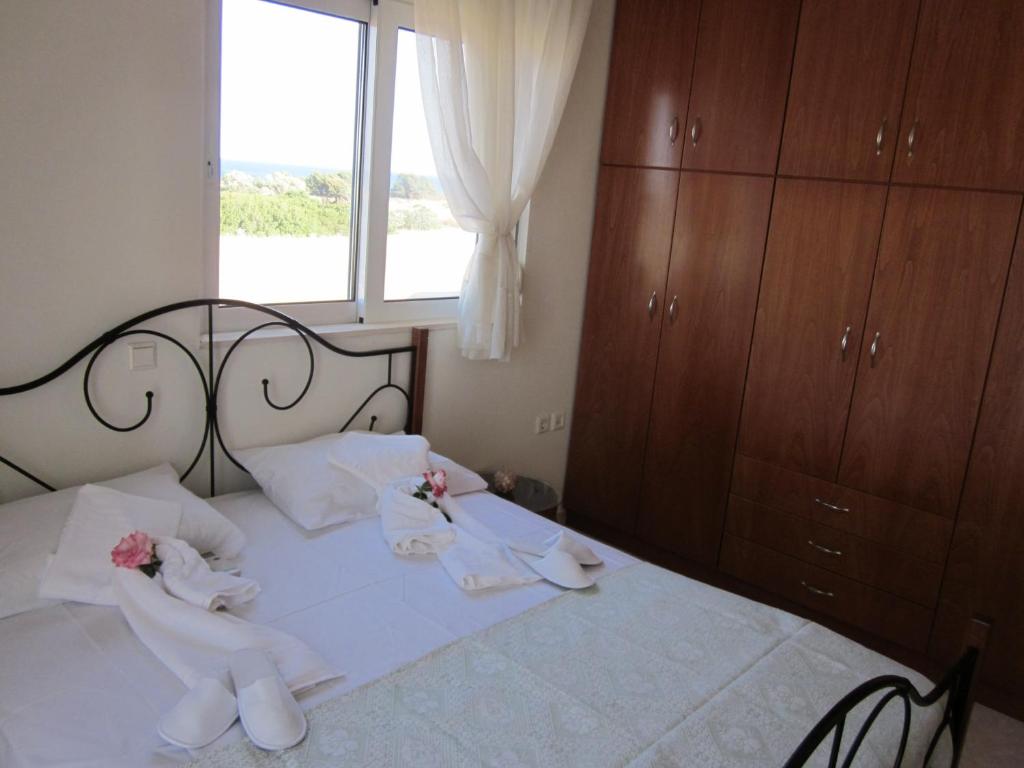 Postel nebo postele na pokoji v ubytování Sunshine Villa