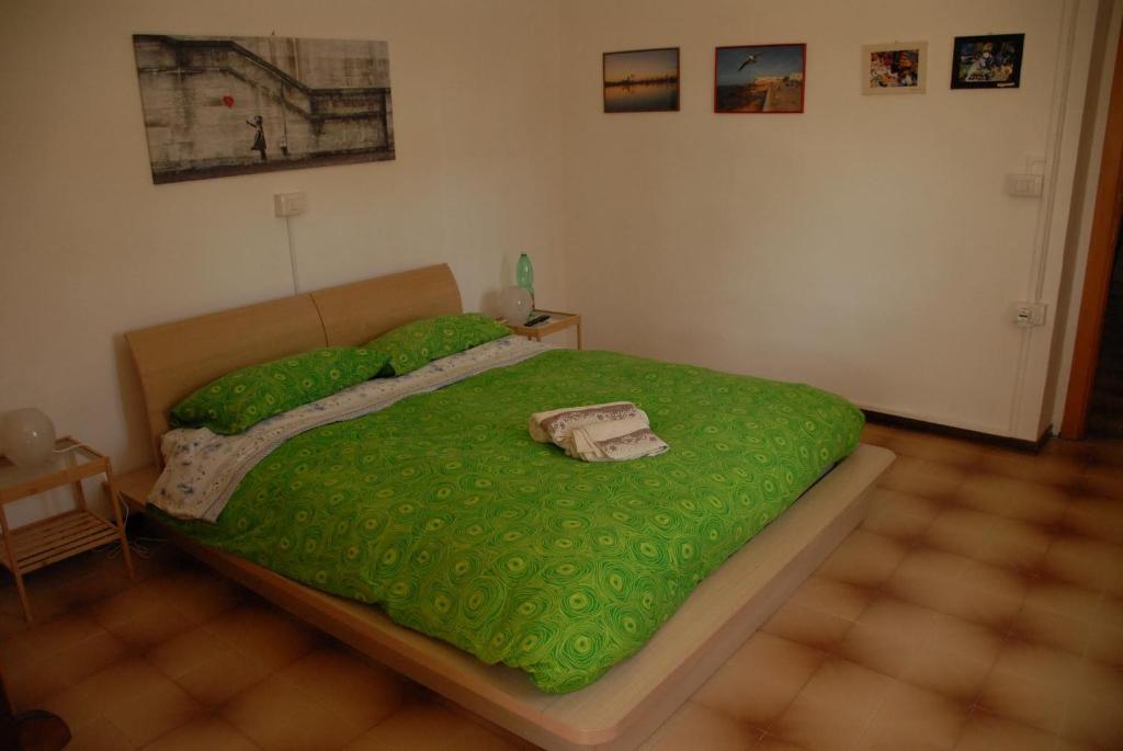 Postel nebo postele na pokoji v ubytování Fattoria Nonno Neno B&B