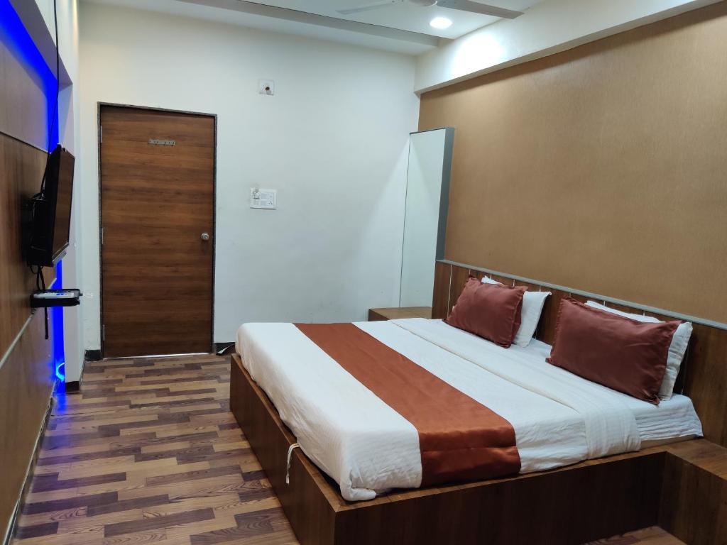 Postel nebo postele na pokoji v ubytování Hotel Nova Prime