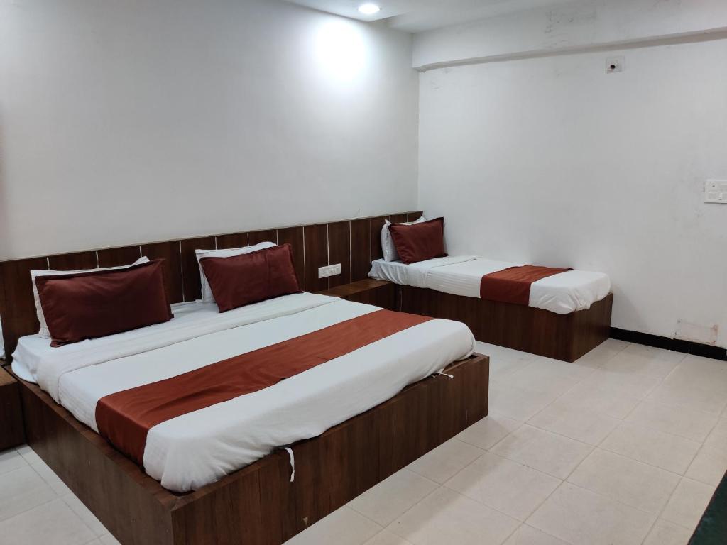 Postel nebo postele na pokoji v ubytování Hotel Nova Prime