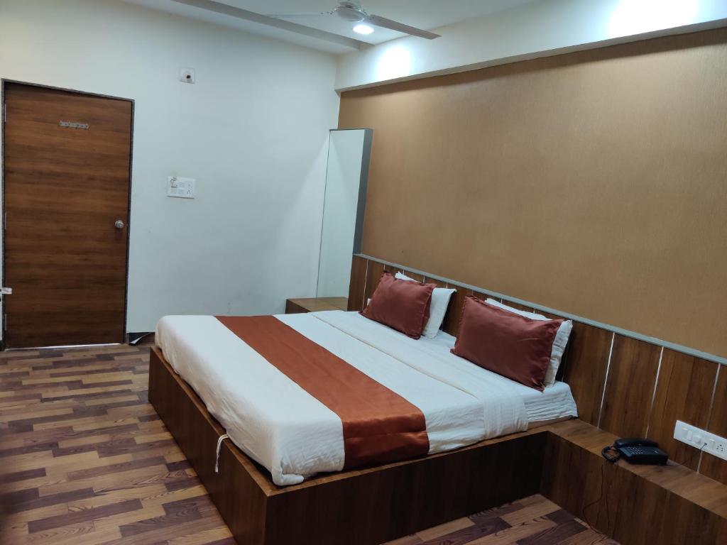 Postel nebo postele na pokoji v ubytování Hotel Nova Prime