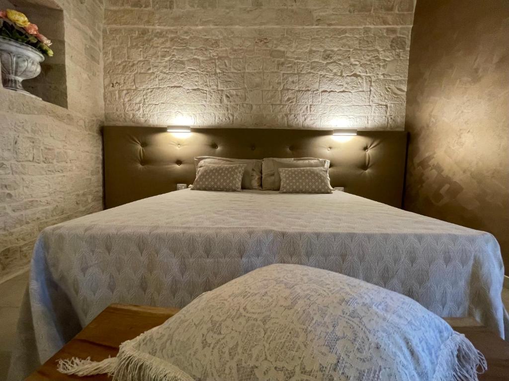 A bed or beds in a room at Antico Corso 74