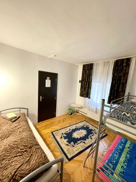 Postel nebo postele na pokoji v ubytování Mosaico Alfetta Hostel