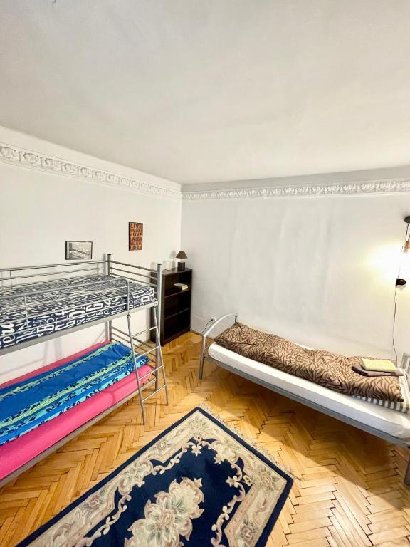 Postel nebo postele na pokoji v ubytování Mosaico Alfetta Hostel