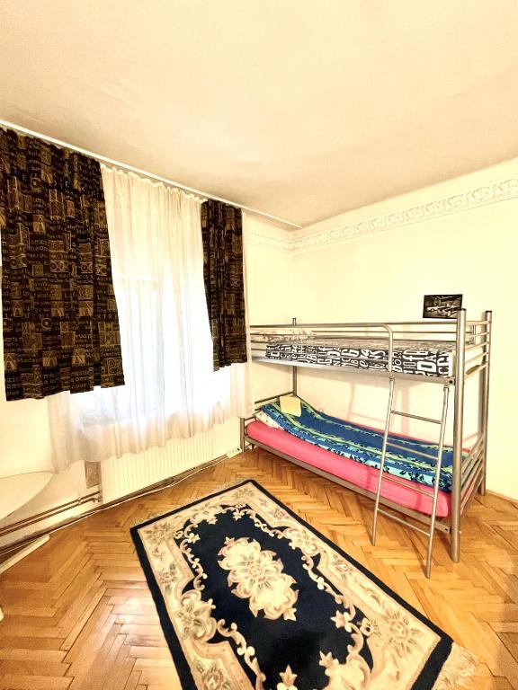 Postel nebo postele na pokoji v ubytování Mosaico Alfetta Hostel