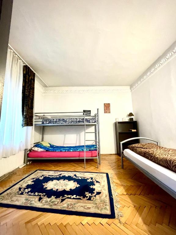 Postel nebo postele na pokoji v ubytování Mosaico Alfetta Hostel
