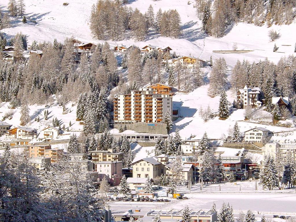 a town covered in snow with a resort at Apartment Guardaval - Utoring-33 by Interhome in Davos