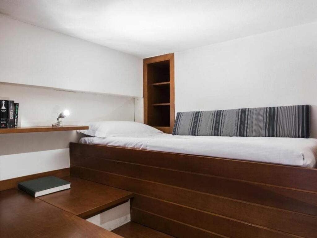 A bed or beds in a room at Georgofili by Halldis