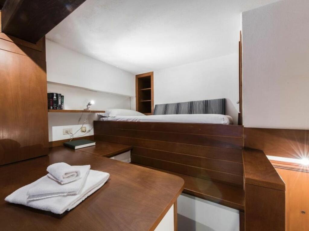 A bed or beds in a room at Georgofili by Halldis