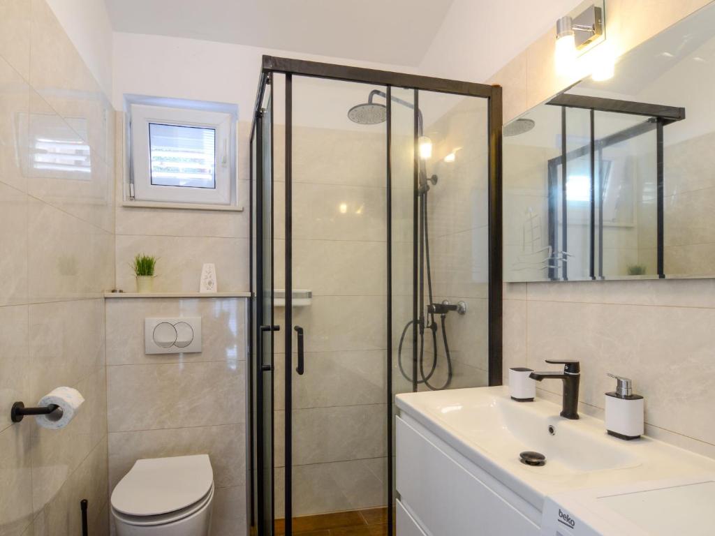 Kúpeľňa v ubytovaní Apartment Mirela-2 by Interhome
