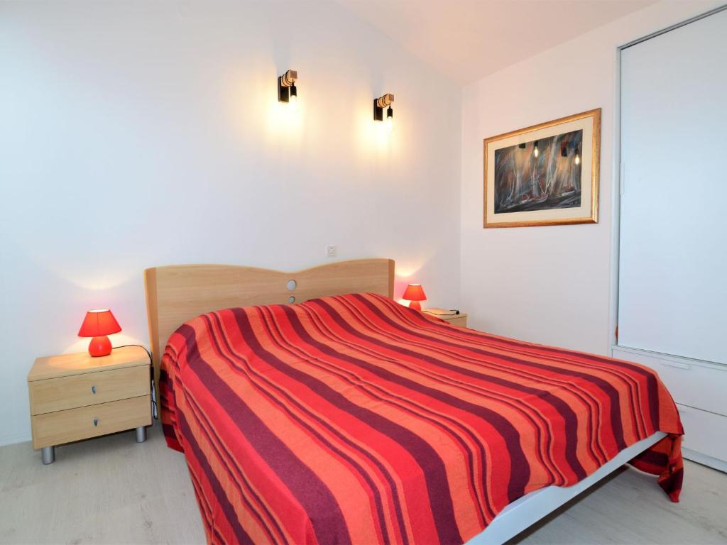 Posteľ alebo postele v izbe v ubytovaní Apartment Mirela-2 by Interhome