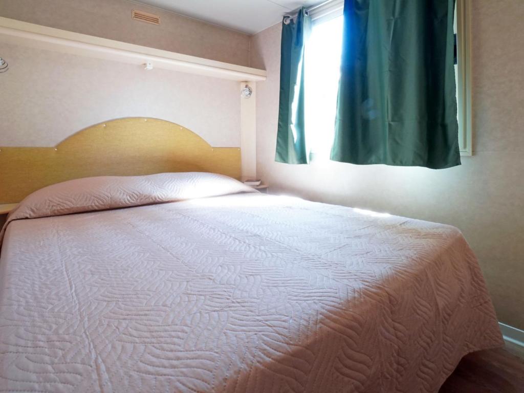 Posteľ alebo postele v izbe v ubytovaní Holiday Home Ponente 6 by Interhome