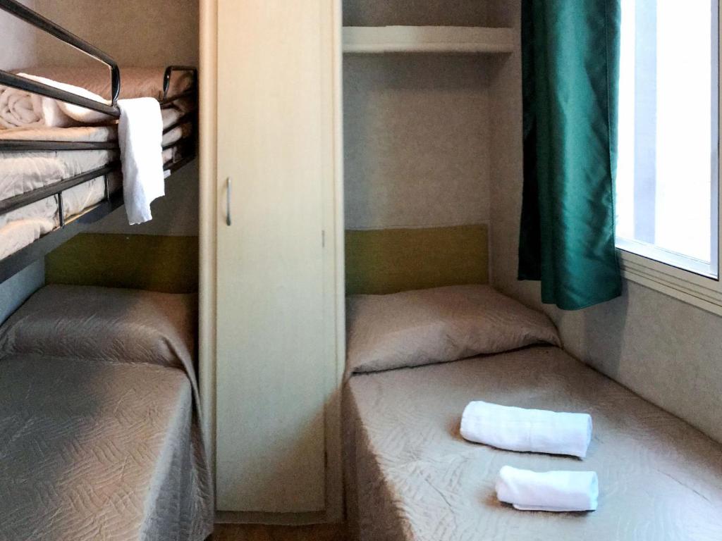 Posteľ alebo postele v izbe v ubytovaní Holiday Home Ponente 6 by Interhome