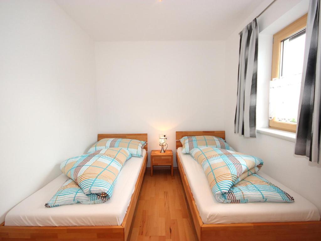 A bed or beds in a room at Apartment Hanna by Interhome
