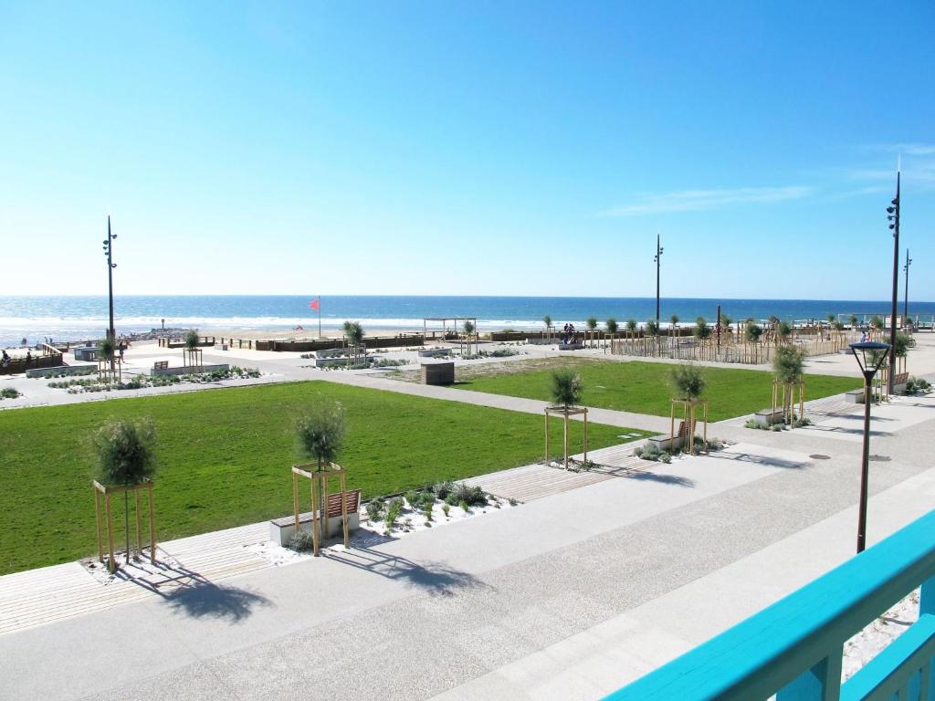 a view of the beach from the balcony of a condo at Apartment L'Oustalet-3 by Interhome in Mimizan-Plage