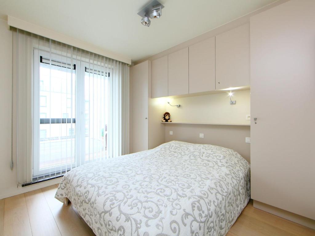 Postel nebo postele na pokoji v ubytování Apartment Cocoon by Interhome