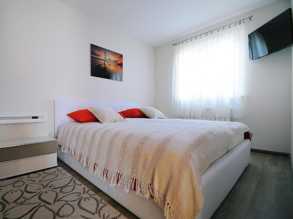Postel nebo postele na pokoji v ubytování Villa Lucija by Interhome