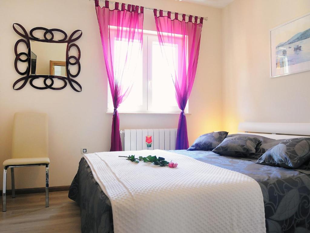 Postel nebo postele na pokoji v ubytování Villa Lucija by Interhome