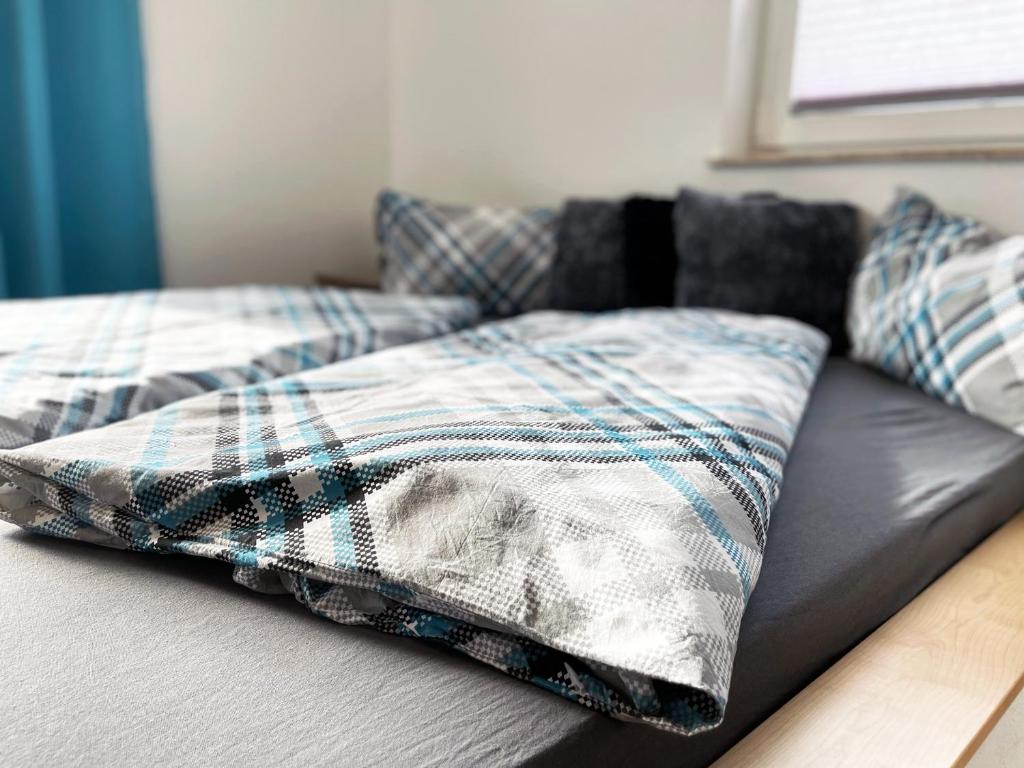Łóżko lub łóżka w pokoju w obiekcie Ferienwohnung Sunhill