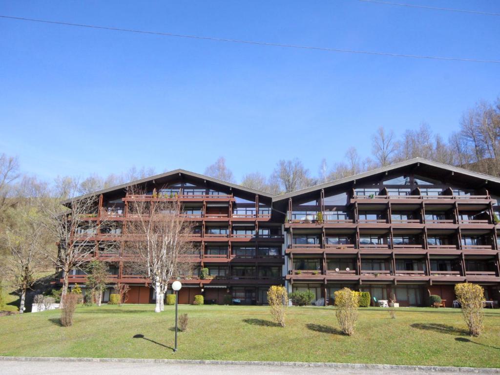 a large building with a park in front of it at Apartment Hinterreit-2 by Interhome in Maria Alm am Steinernen Meer