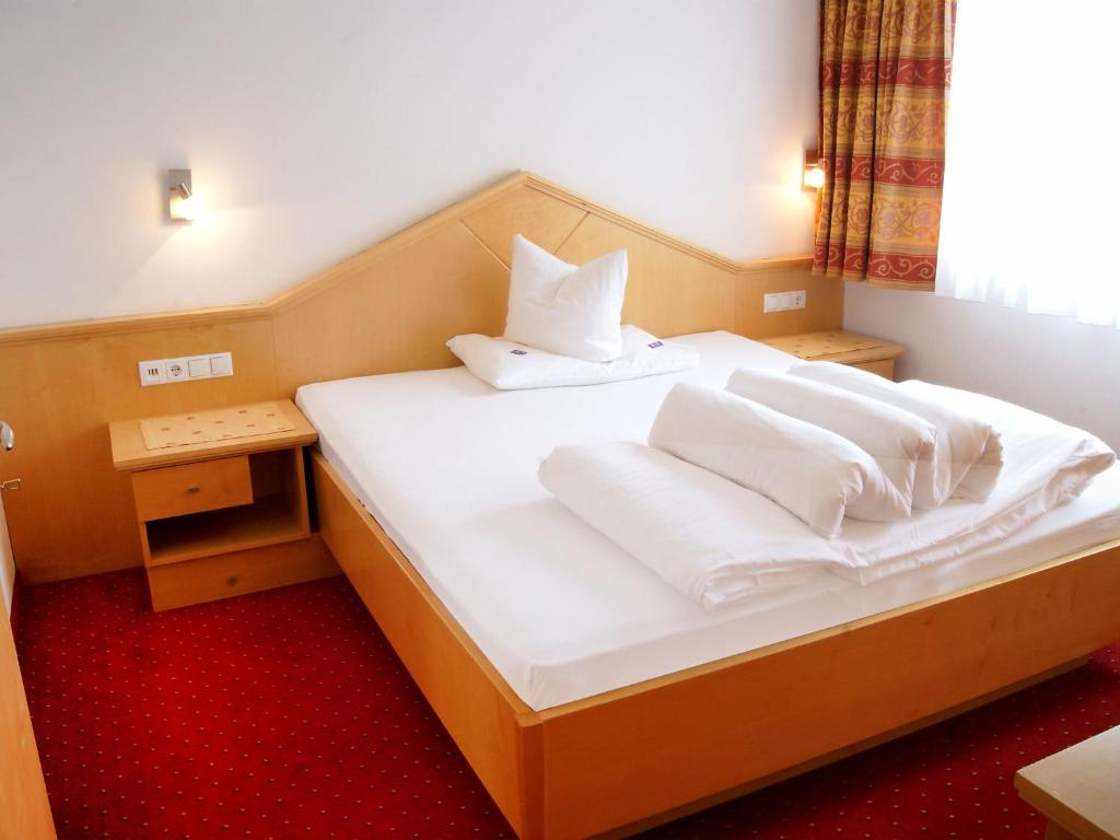 Posteľ alebo postele v izbe v ubytovaní Apartment Falkner-12 by Interhome