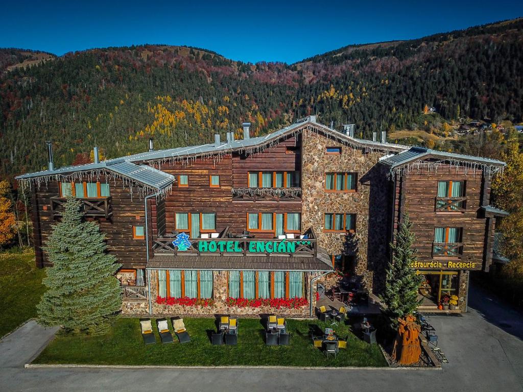 an aerial view of a hotel in the mountains at Horsky Hotel Encian Donovaly in Donovaly