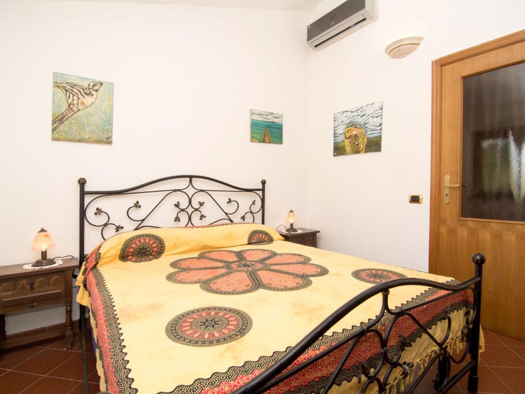 Łóżko lub łóżka w pokoju w obiekcie Villa Tenuta Valente by Interhome