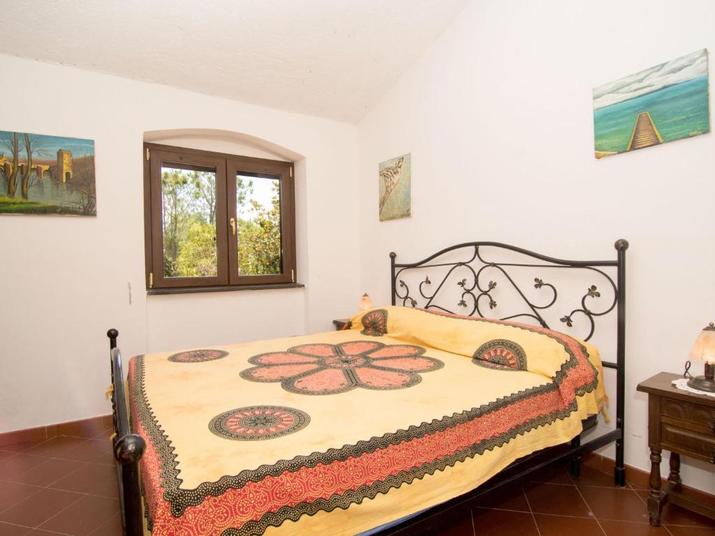 Łóżko lub łóżka w pokoju w obiekcie Villa Tenuta Valente by Interhome