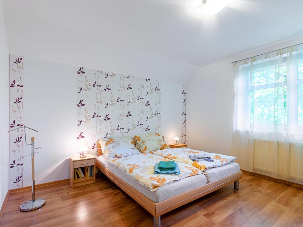Postel nebo postele na pokoji v ubytování Holiday Home Albrechtice by Interhome