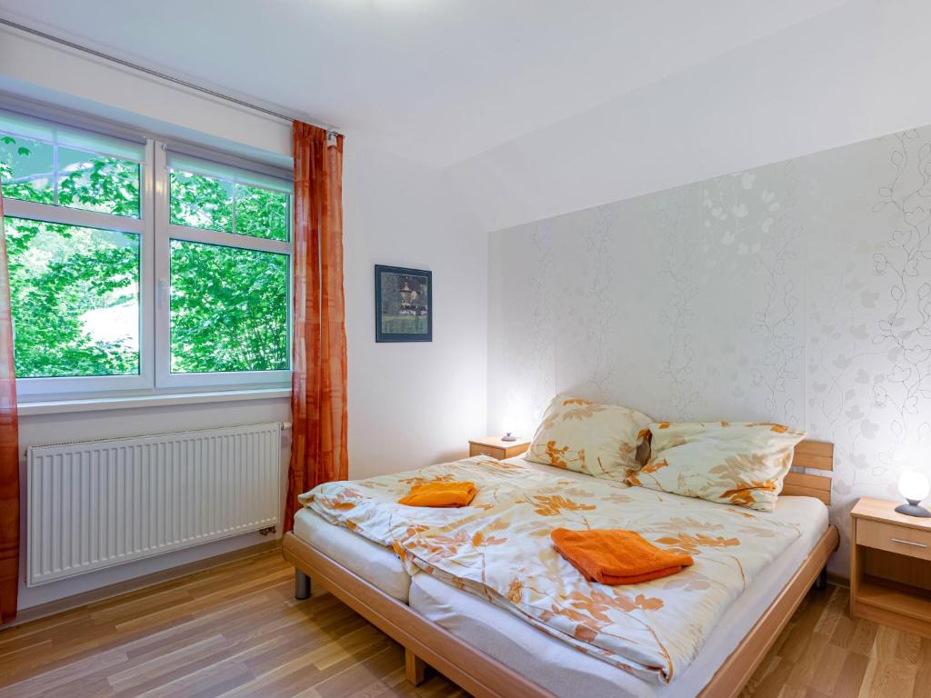 Postel nebo postele na pokoji v ubytování Holiday Home Albrechtice by Interhome