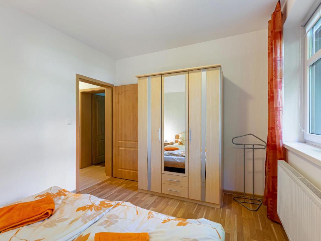 Postel nebo postele na pokoji v ubytování Holiday Home Albrechtice by Interhome