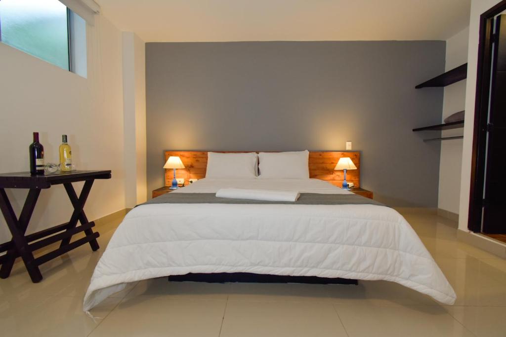 Postel nebo postele na pokoji v ubytování Tik by Bernalo Hotels