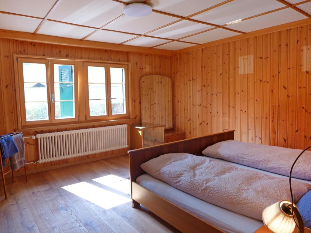 Postel nebo postele na pokoji v ubytování Apartment Chalet Alte Post by Interhome
