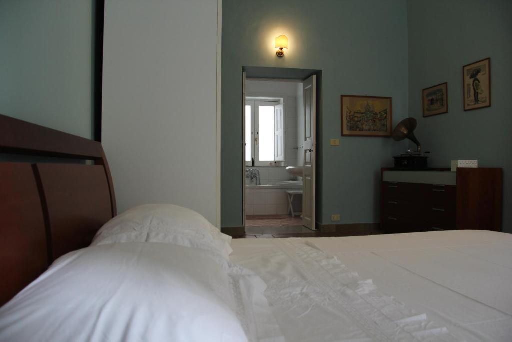 Posteľ alebo postele v izbe v ubytovaní Casa Vacanza Icaros, Ortigia hictoric center, 200 mt from the beach