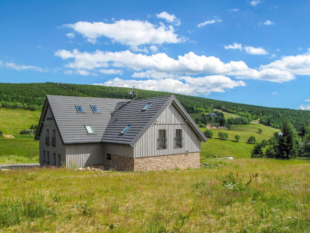 a house on a hill in a field at Apartment Na Pomezkách by Interhome in Horní Malá Úpa