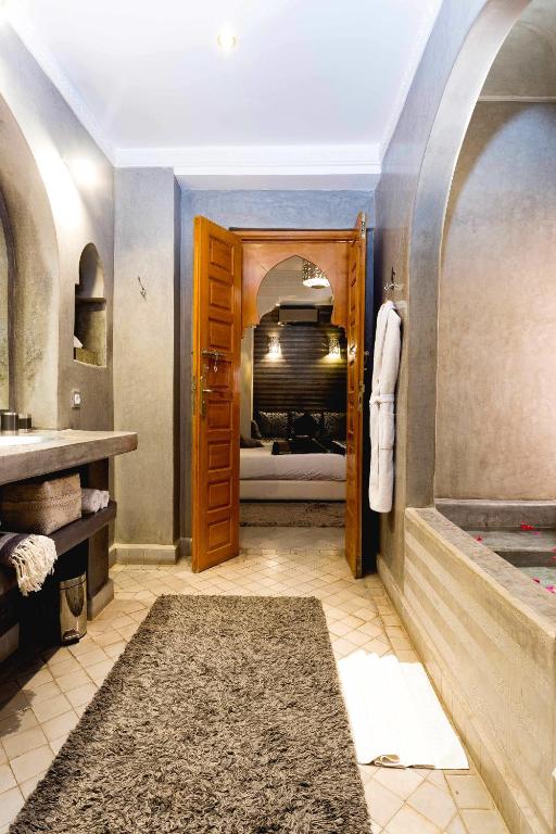 Postel nebo postele na pokoji v ubytování Riad Mazaya