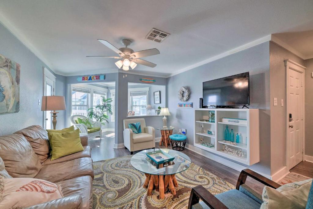 A seating area at Coastal Condo with Outdoor Pool - Pets Welcome!