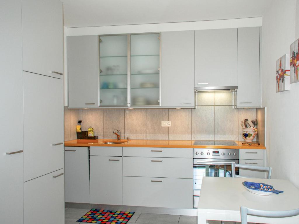 Kuchyň nebo kuchyňský kout v ubytování Apartment Ca' dal Pio by Interhome