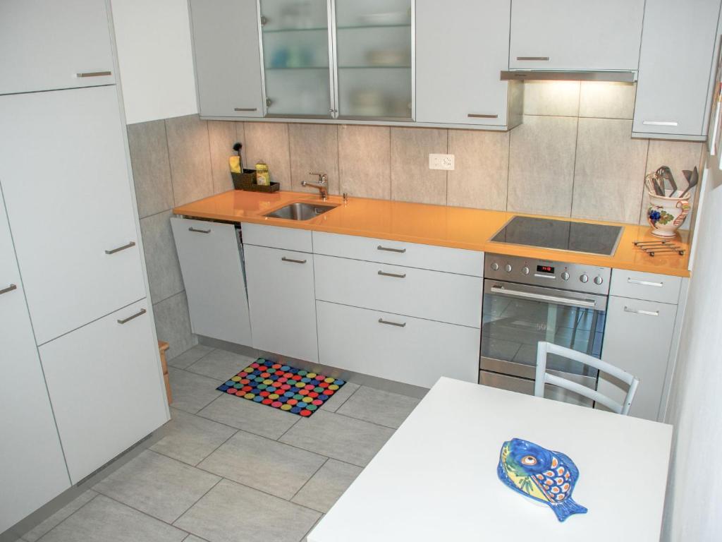 Kuchyň nebo kuchyňský kout v ubytování Apartment Ca' dal Pio by Interhome