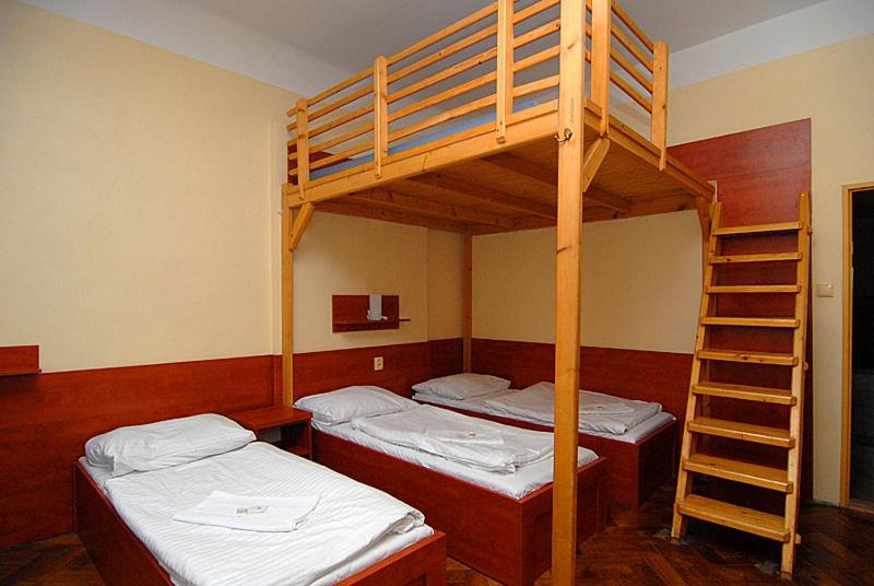 Postel nebo postele na pokoji v ubytování Pension Akat