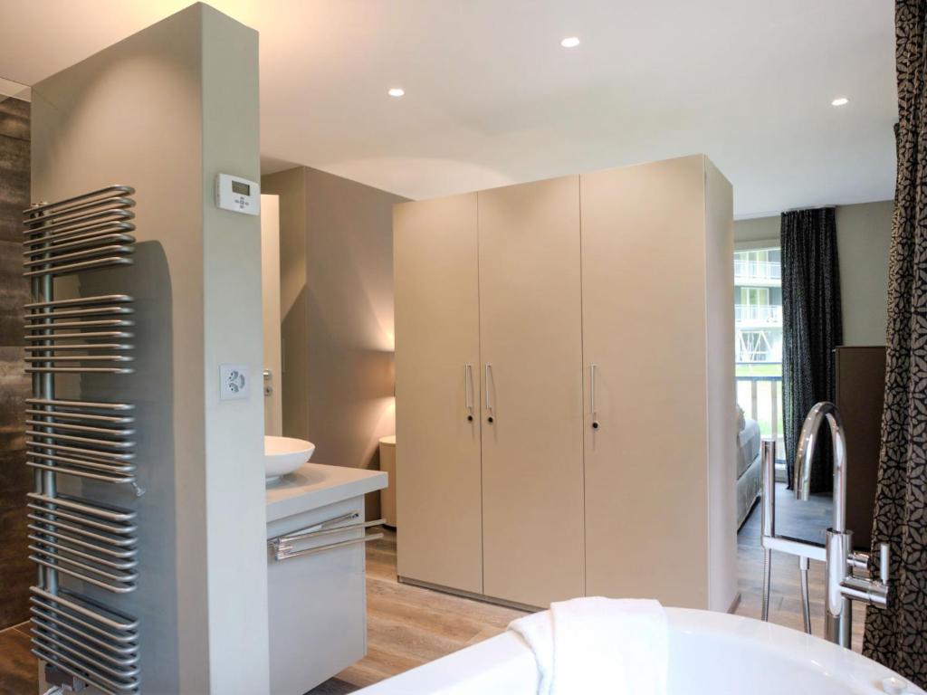 Postel nebo postele na pokoji v ubytování Apartment Dione by Interhome