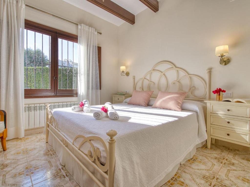 Postel nebo postele na pokoji v ubytování Villa Villa Monte Feliz by Interhome