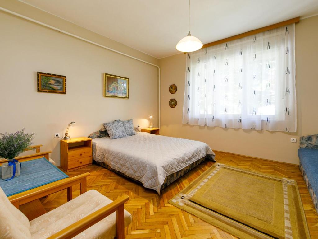Łóżko lub łóżka w pokoju w obiekcie Holiday Home Marian by Interhome