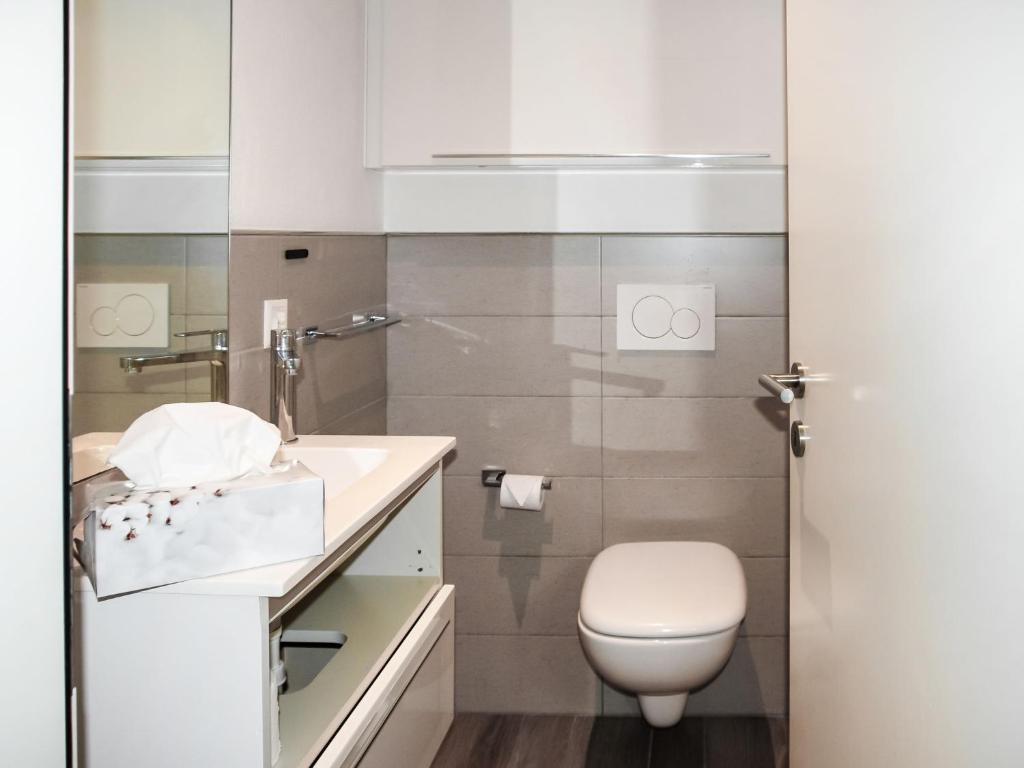 Koupelna v ubytování Apartment App- Vira Lago 500 Ost - EG by Interhome